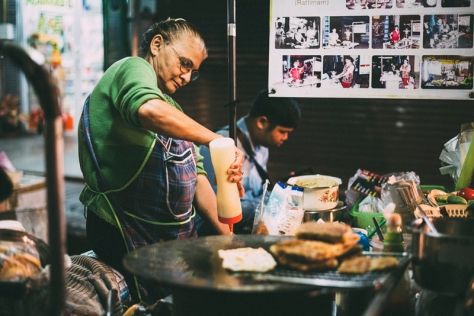 Lady preparing Roti Mataba in the streets of Chiang Mai.